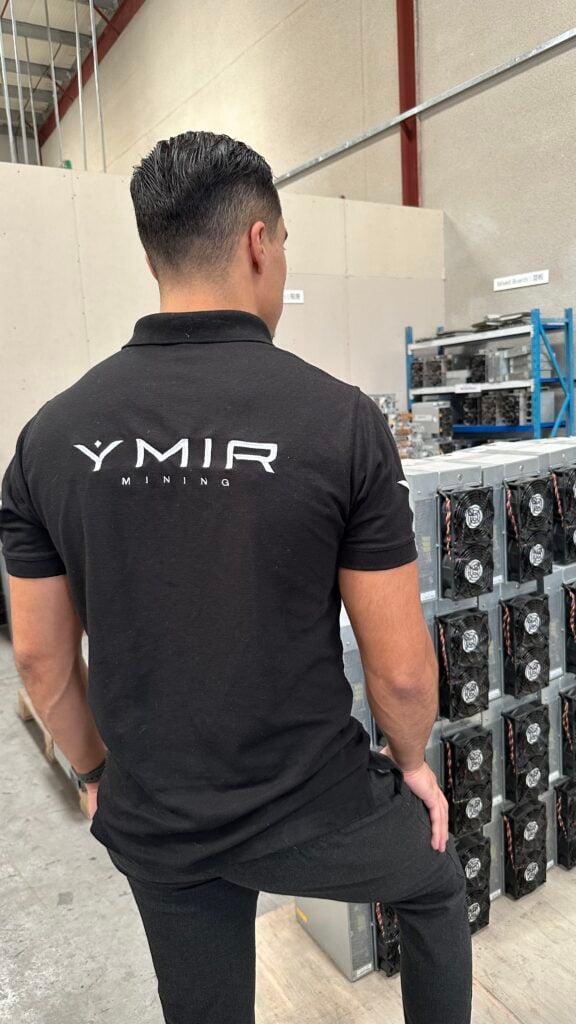 Mining racks inside a Ymir facility